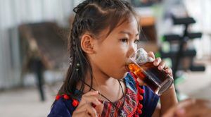 Young,Girl,Is,Drinking,Soft,Drink.